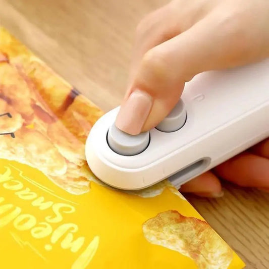 Keep Your Food Fresh with the Rechargeable 2-in-1 Mini Bag Sealer and Cutter – Perfect for Home and Retail Use!